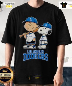 Original Los Angeles Dodgers Charlie Brown and Snoopy baseball cartoon fan T-shirt featuring iconic characters in team colors.