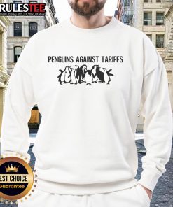 Funny sweatshirt featuring a meme of top penguins sarcastically commenting on tariffs. Perfect for humor lovers!