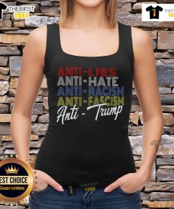 Alt Text: Premium anti-hate tank top featuring bold stripes and messages against lies, racism, fascism, and Trump.