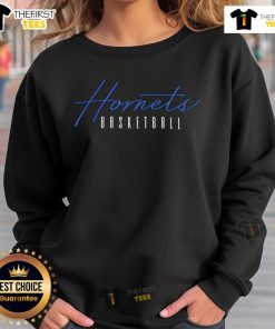 Alt Text: Premium Charlotte Hornets training day sweatshirt featuring team colors and logo, perfect for fans and workouts.