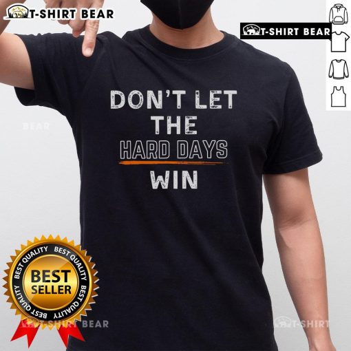 Alt Text: Premium Dont Let The Hard Days Win T-Shirt featuring motivational text design on a stylish black background.