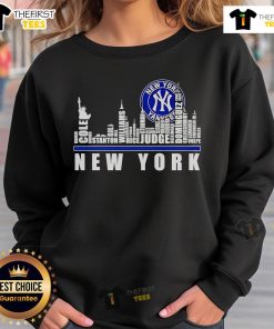 Premium Skyline City New York Yankees players name sweatshirt displayed on a hanger, showcasing team spirit and style.