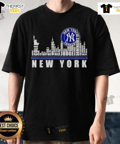 Premium skyline city New York Yankees players name T-shirt showcasing iconic team logo and cityscape design.