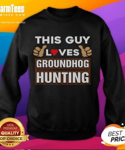 Alt Text: Premium sweatshirt featuring a fun design that says 'This Guy Loves Groundhog Hunting' for outdoor enthusiasts.