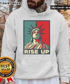 Alt Text: Premium Vintage Rise Up Wise Up Eyes Up Hamilton Statue of Liberty Hoodie featuring a unique artistic design.
