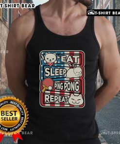 Adorable cat lounging in a patriotic tank top, perfect for ping pong enthusiasts: Eat, Sleep, Ping Pong, Repeat.