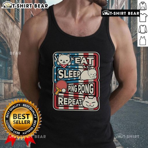 Adorable cat lounging in a patriotic tank top, perfect for ping pong enthusiasts: Eat, Sleep, Ping Pong, Repeat.
