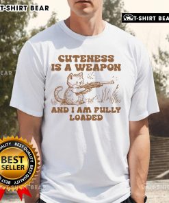 Alt Text: Pretty Cuteness Is A Weapon And I Am Fully Loaded Cat T-Shirt design featuring a cute cat graphic and playful text.