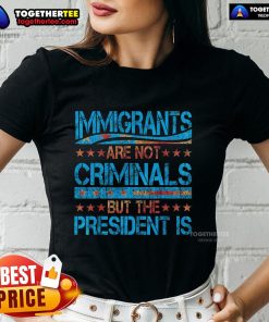 Pretty Immigrants Are Not Criminals But The President Is Ladies Tee showcasing a bold statement on immigration rights.