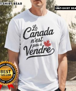 Pretty Le Canada N'Est Pas Vendre T-Shirt featuring 'Canada Is Not For Sale' design in vibrant colors.