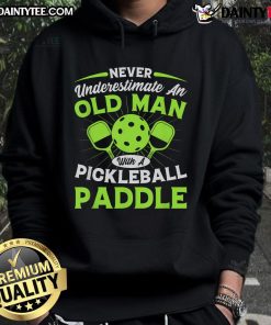 Pretty Never Underestimate An Old Man With A Pickleball Paddle Premium Hoodie featuring a playful design and vibrant colors.