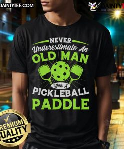 Pretty Never Underestimate An Old Man With A Pickleball Paddle Premium T-Shirt featuring a humorous pickleball design.