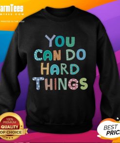 Teacher wearing a 'You Can Do Hard Things' sweatshirt on test day, inspiring students with positive motivation.