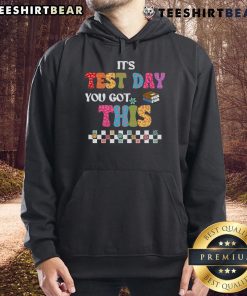 Student wearing a 'Test Day, You Got This' hoodie, smiling confidently, ready for exam motivation from their teacher.