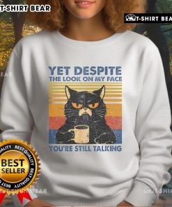 Cozy sweatshirt featuring a cat design and humorous text: 'Top Cat - Yet Despite The Look On My Face, You're Still Talking.'