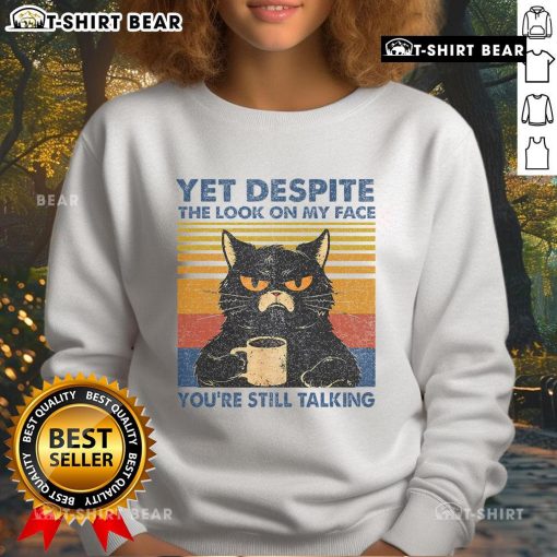 Cozy sweatshirt featuring a cat design and humorous text: 'Top Cat - Yet Despite The Look On My Face, You're Still Talking.'
