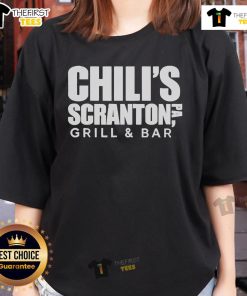 Top Chilis Scranton PA Grill and Bar branch features a stylish ladies tee in a vibrant setting, perfect for casual outings.