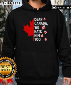Alt Text: Political protest hoodie featuring 'Dear Canada, We Hate Him Too' slogan, perfect for expressing dissent.