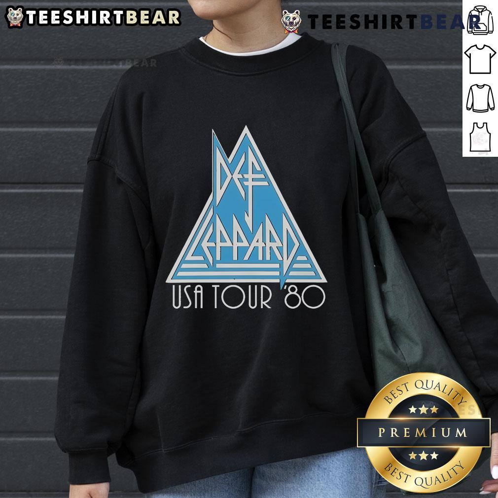Top Def Leppard Usa Tour '80 Sweatshirt Vintage Def Leppard USA Tour '80 sweatshirt featuring iconic band logo and tour graphics in bold colors.