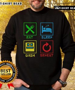 Cozy sweatshirt featuring 'Eat Sleep Dash Repeat' design for video gamers, perfect for gaming sessions.