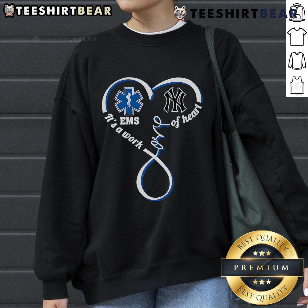 Top Ems It'S A Work Of Heart New York Yankees Sweatshirt Alt Text: Cozy New York Yankees sweatshirt from Top Ems, featuring a heart design, perfect for fans and casual wear.