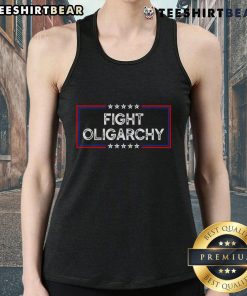 Activist wearing a 'Top Fight Oligarchy' tank top, standing against corporate greed at a protest rally.