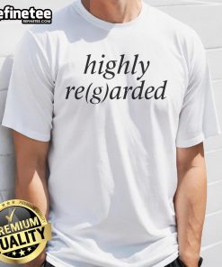 Top Highly Regarded T-Shirt displayed on a wooden table, showcasing its quality fabric and stylish design.