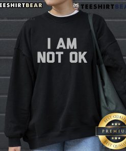 Cozy 'I Am Not Ok' sweatshirt featuring a casual design, perfect for comfort and expressing feelings in style.