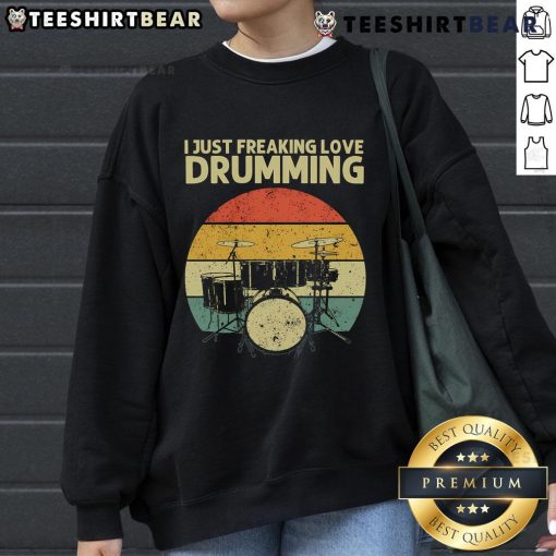 Alt Text: Retro sunset sweatshirt featuring 'Top I Just Freaking Love Drumming' design, perfect for passionate drummers.