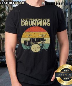 Retro sunset T-shirt featuring a drummer with 'I Just Freaking Love Drumming' slogan, perfect for music lovers.