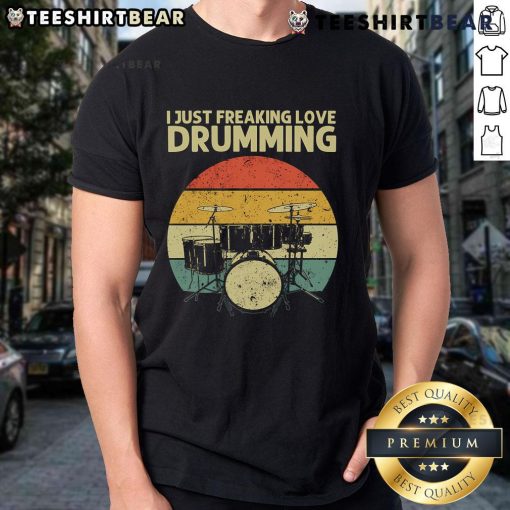 Retro sunset T-shirt featuring a drummer with 'I Just Freaking Love Drumming' slogan, perfect for music lovers.
