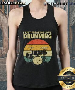 Retro sunset tank top featuring the phrase 'I Just Freaking Love Drumming' worn by a drummer against a colorful backdrop.
