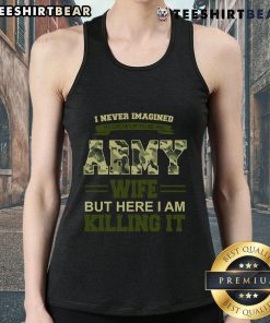 Army wife proudly wearing a 'Killing It' tank top, showcasing strength and support for military life.