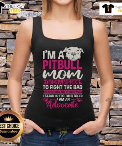 Alt Text: Pitbull mom wearing an advocate tank top, promoting positive change against stereotypes and bad reputations.
