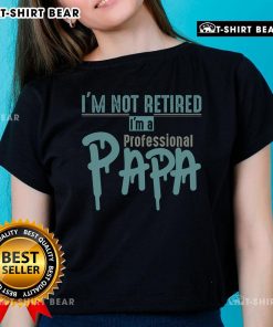 Top I'm Not Retired I'm A Professional Papa Ladies Tee in vibrant colors showcasing a playful design for proud dads.