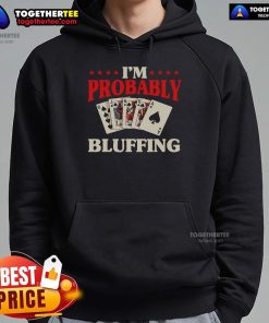 Alt Text: Gambler wearing 'Top I'm Probably Bluffing' hoodie at a casino poker card game, showcasing a fun poker-themed design.