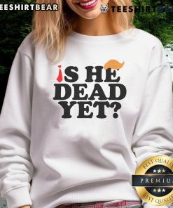 Cozy 'Top Is He Dead Yet 2025' sweatshirt featuring a bold graphic design, perfect for casual wear and fans of humor.