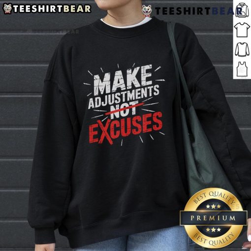 Motivational sweatshirt featuring 'Make Adjustments, Not Excuses' slogan, perfect for hustle and discipline enthusiasts.