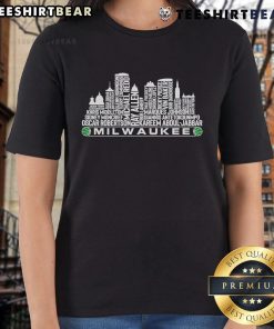 Milwaukee skyline with basketball legends graphic on a ladies tee, celebrating the top Milwaukee basketball team of all time.