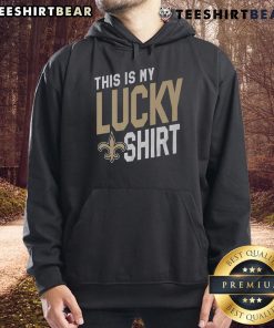 Alt Text: Man wearing 'This Is My Lucky Hoodie' showcasing New Orleans Saints pride at a game.