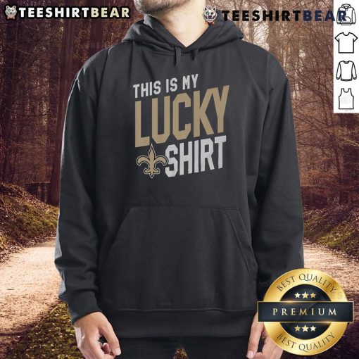 Alt Text: Man wearing 'This Is My Lucky Hoodie' showcasing New Orleans Saints pride at a game.