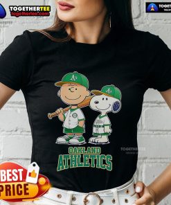 Charlie Brown and Snoopy baseball cartoon on a ladies tee for Oakland Athletics fans, blending sports and nostalgia.