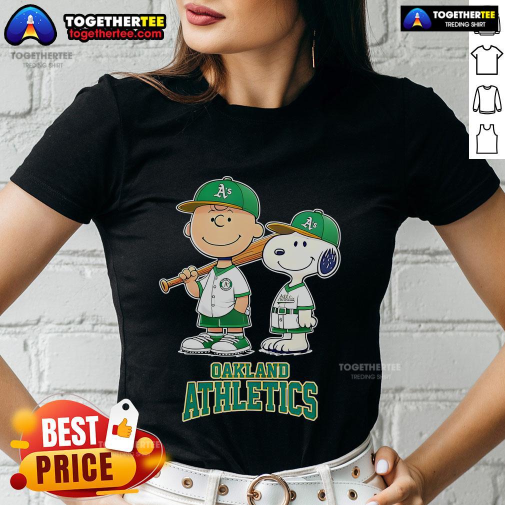 Top Oakland Athletics Charlie Brown And Snoopy Baseball Cartoon Fan Ladies Tee Charlie Brown and Snoopy baseball cartoon on a ladies tee for Oakland Athletics fans, blending sports and nostalgia.