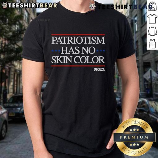 Top Patriotism Has No Skin Color T-Shirt displayed on a hanger, featuring a bold, inclusive message in vibrant colors.