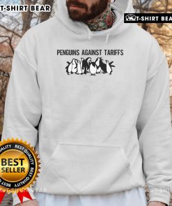 Top Penguins Against Tariffs meme hoodie featuring humorous penguin characters and sarcastic text design.