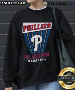 Alt Text: Top Philadelphia Phillies baseball starter sweatshirt featuring team logo and vibrant colors, perfect for fans.