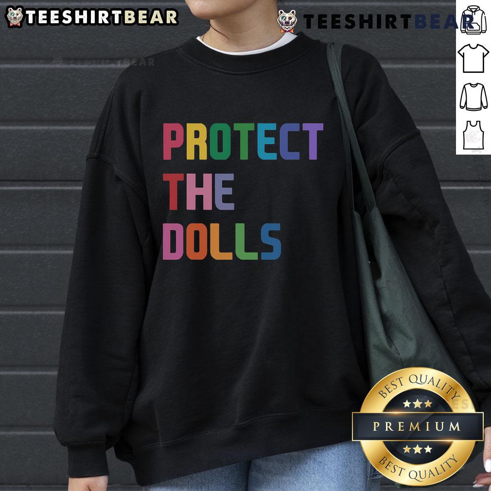 Top Protect The Dolls Sweatshirt Cozy Top Protect The Dolls sweatshirt featuring vibrant graphics, perfect for fans of trendy streetwear and doll culture.