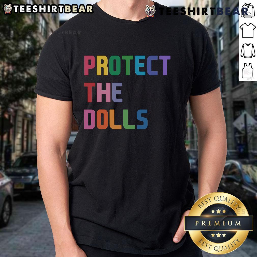 Top Protect The Dolls T Shirt Top Protect The Dolls T-Shirt featuring a vibrant graphic design promoting doll safety and empowerment.