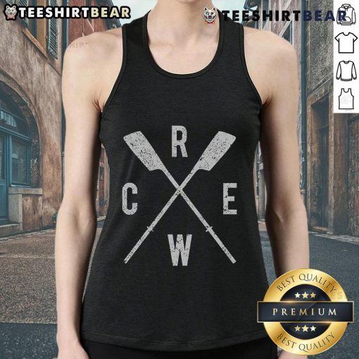 Top rowing crew with crossed oars, rowers in tank tops, coached by a dedicated team leader on the water.