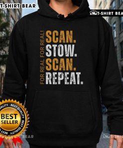 Warehouse worker wearing a 'Top Scan Stow Scan Repeat' hoodie, focused on efficient inventory management tasks.